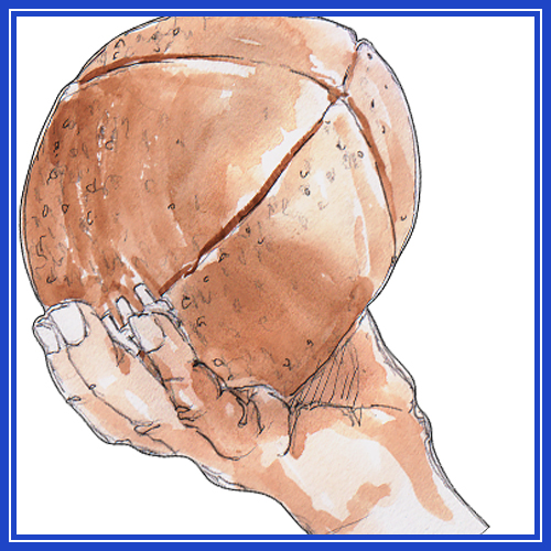 Hand holding a football - by Karen Little of Littleviews