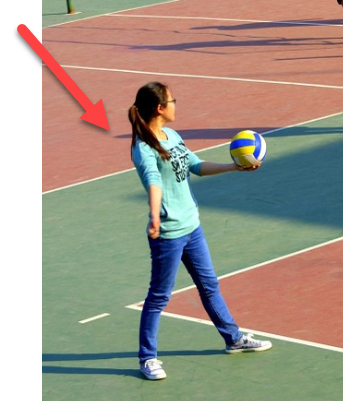 Reference photo of a woman serving a volleyball from Pixabay.com
